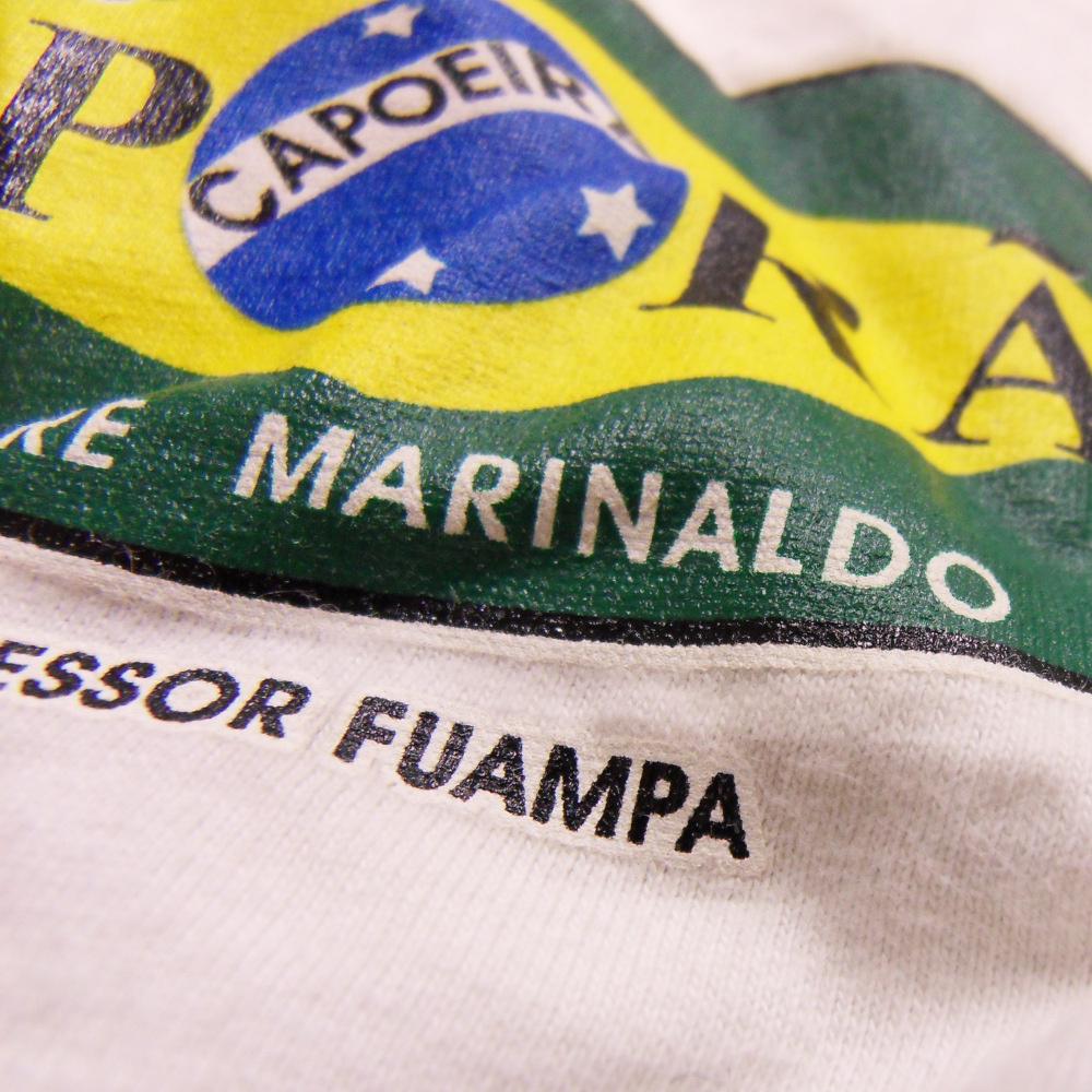 Żółta koszulka sportowa z zielonym nadrukiem Brasil